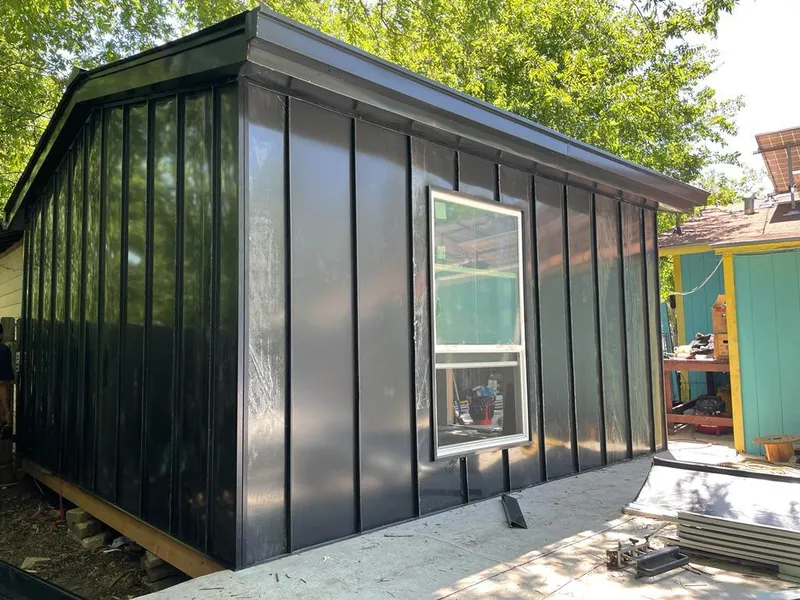 Black standing seam metal wall panels for Roof Inspection in Shelby