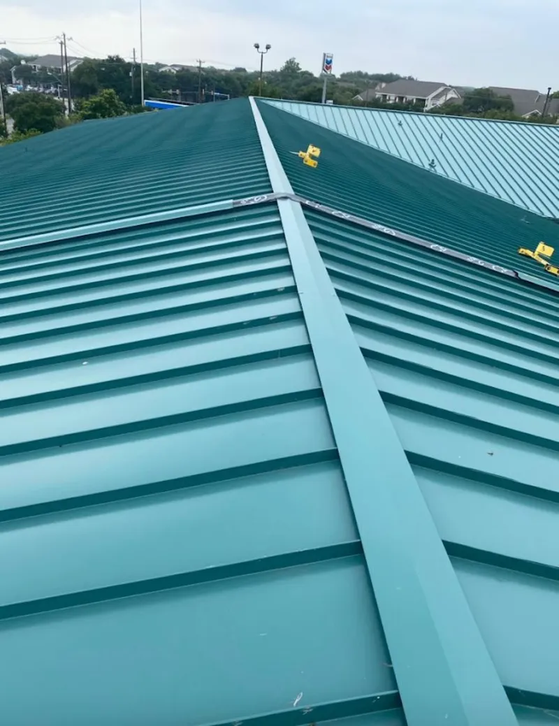 Green commercial metal roof ridge and valley for Metal Roof Repair in Shelby